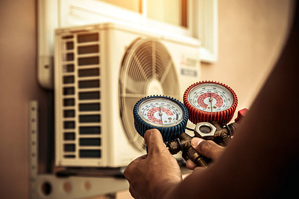 Professional Heat Pump Repair technician working in Rye, NH